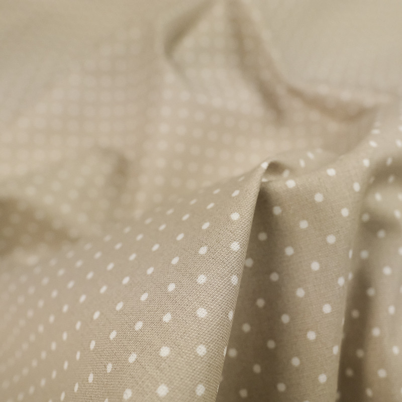 Tissu coton enduit taupe pois blanc - 10cm