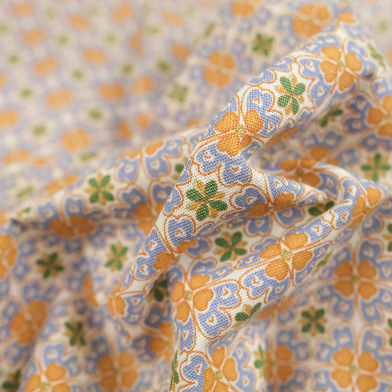 Coton imprimé trèfle mosaïque bleu et orange - 10cm