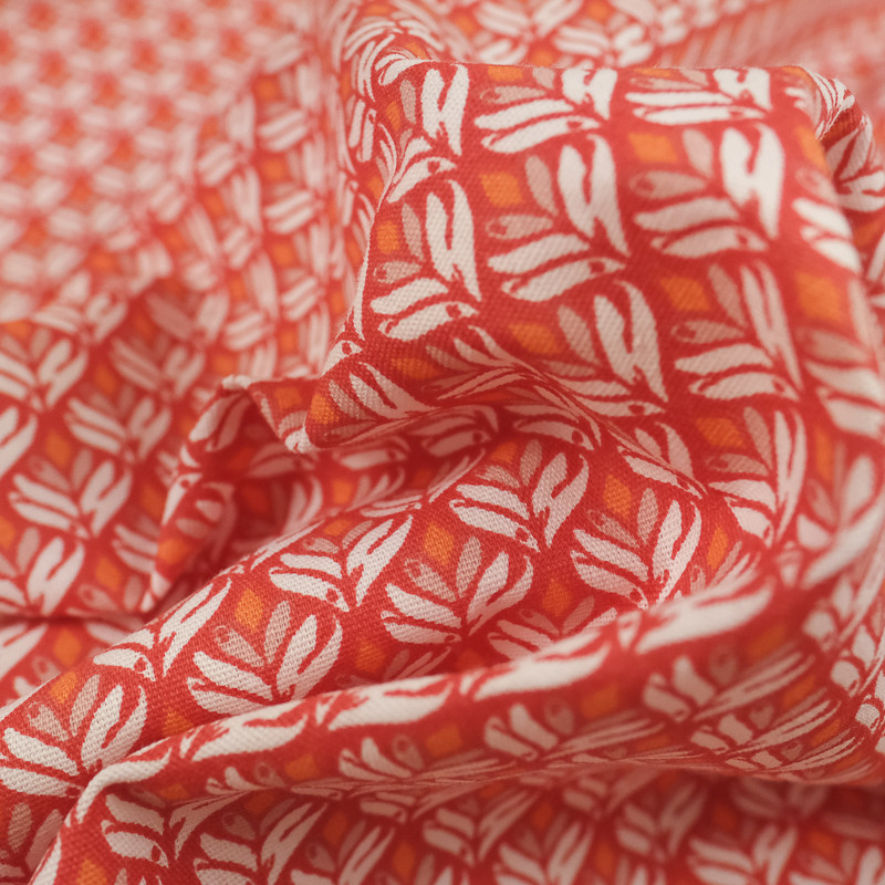 Coton imprimé plumes rouge et orange - 10cm