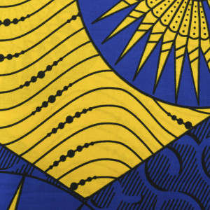 Tissu africain motif soleil graphique jaune fond bleu roi