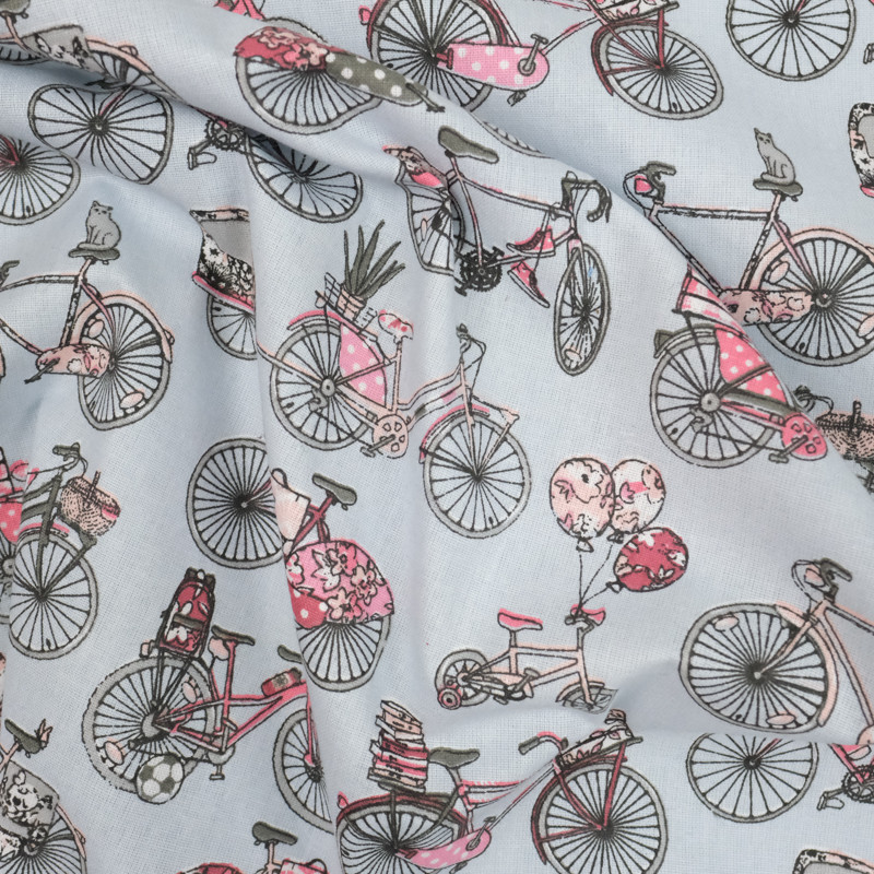 Coton imprimé vélo rose sur fond gris