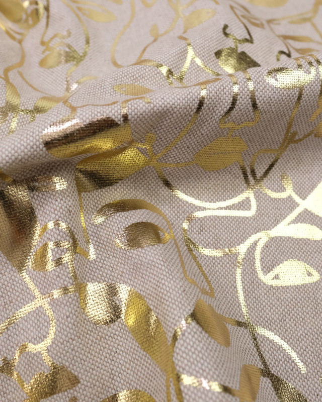 Tissu aspect lin motif visage doré - Mercerine