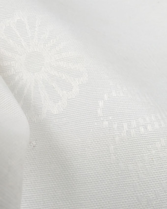 Tissu enduit motif floral ton sur ton blanc