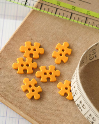 Bouton puzzle jaune 15mm 2 trous - Mercerine