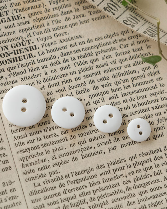 Bouton à coudre : blanc mat 2 trous - Mercerine