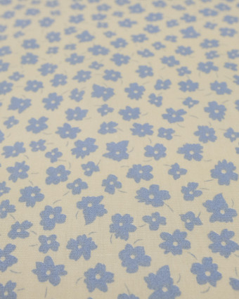 Coton imprimé fleur bleu ciel fond crème - Mercerine