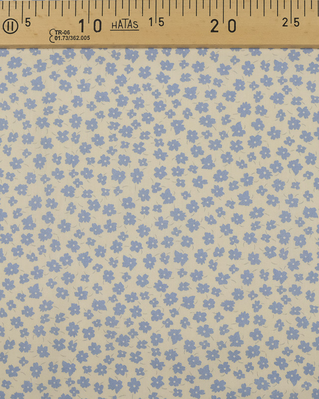 Coton imprimé fleur bleu ciel fond crème - Mercerine