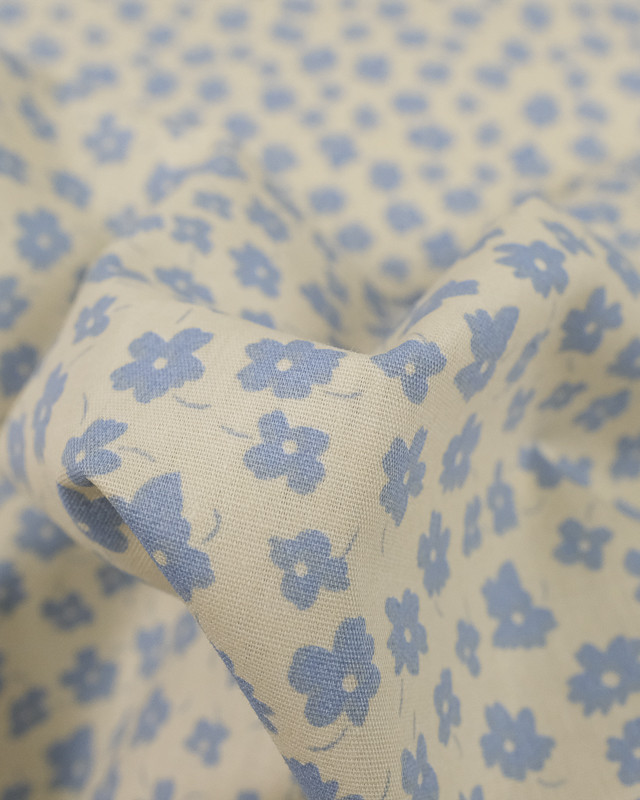 Coton imprimé fleur bleu ciel fond crème - Mercerine