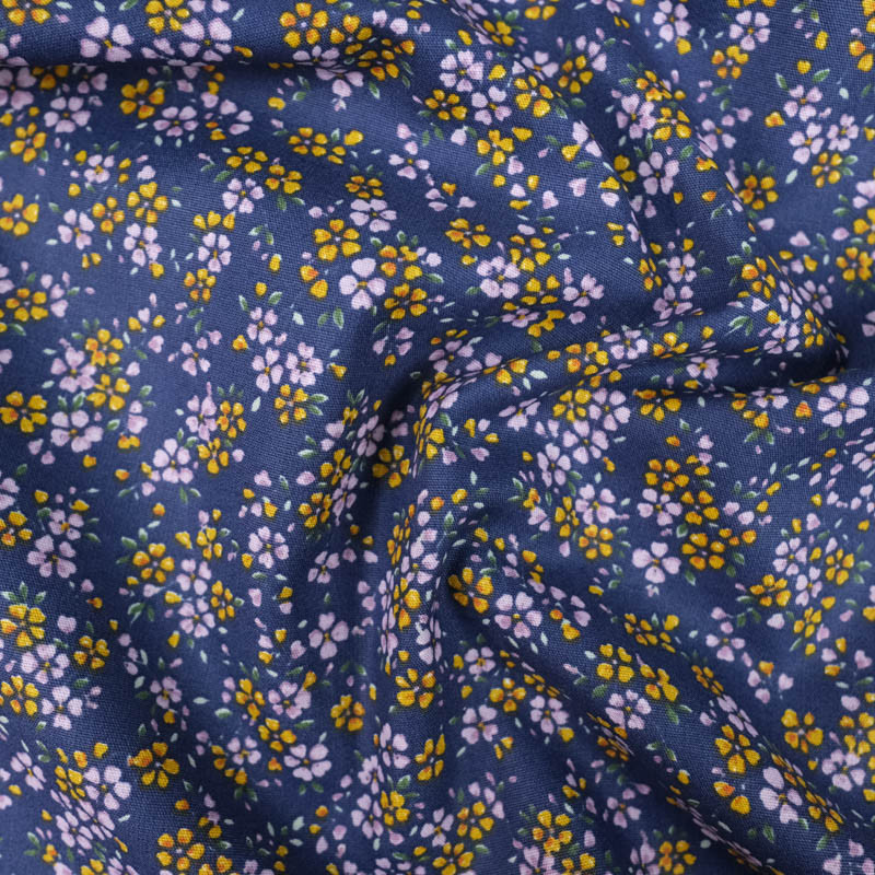 Popeline de coton petites fleurs fond bleu - Mercerine