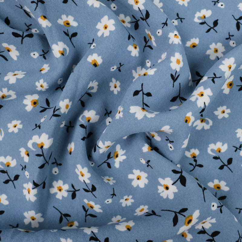 Crêpe extensible petite fleur blanche Bleu ciel - Mercerine