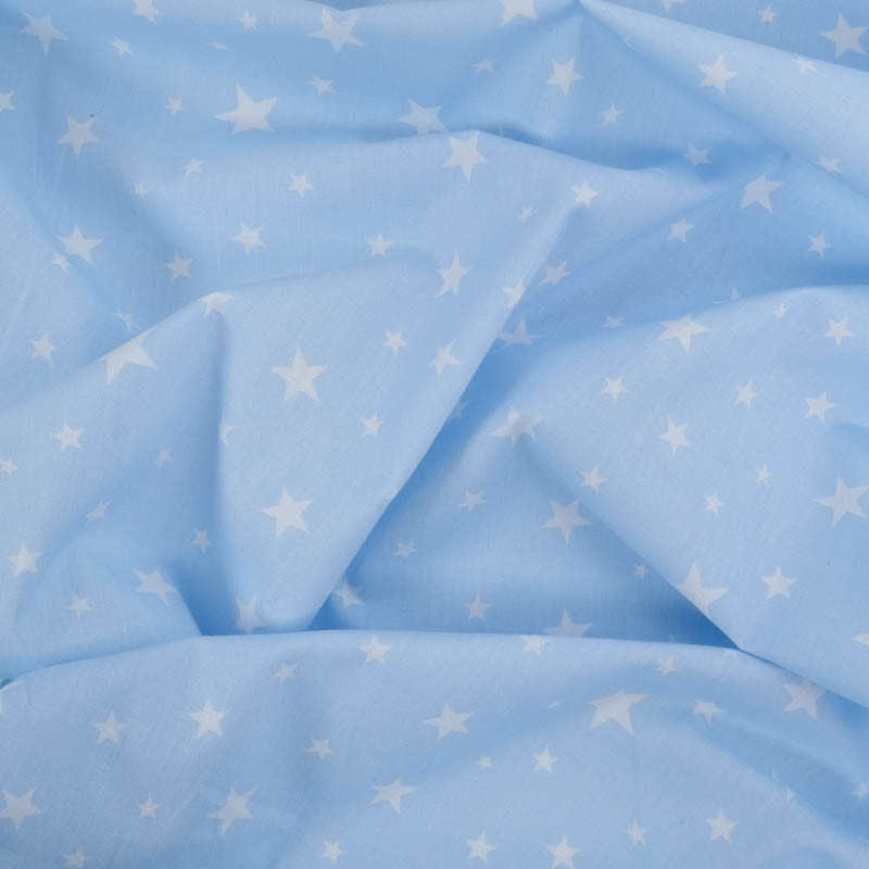Coton imprimé étoiles fond bleu ciel - Mercerine
