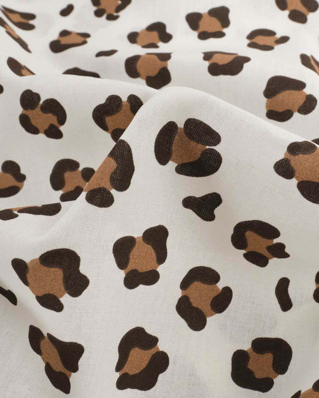 Popeline de Coton Ecrue Motif Léopard Caramel - Mercerine