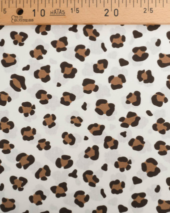 Popeline de Coton Ecrue Motif Léopard Caramel - Mercerine