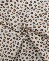 Popeline de Coton Ecrue Motif Petit Léopard Caramel