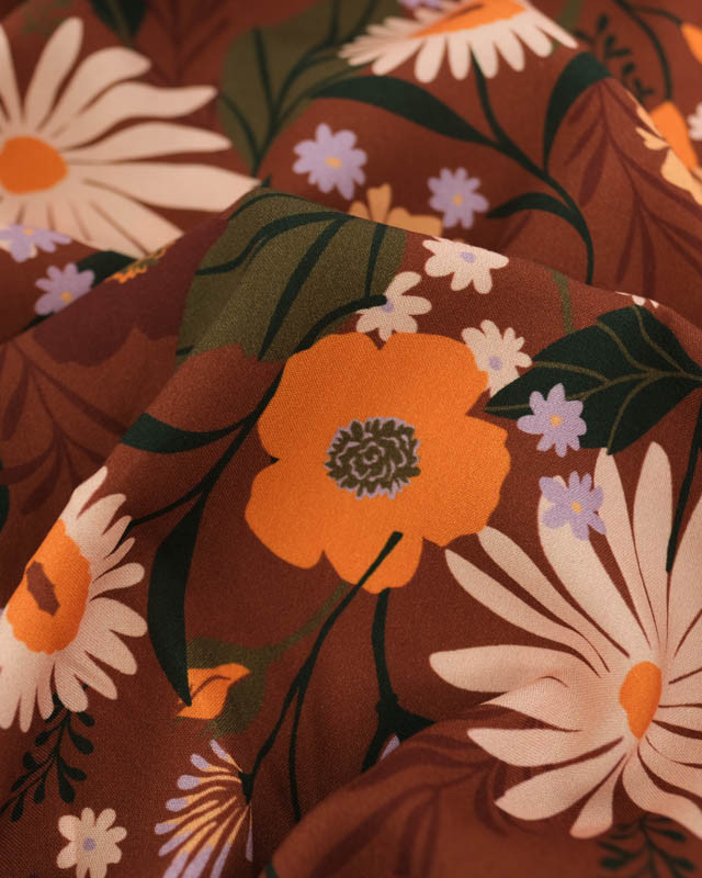 Tissu Viscose motif Marguerites et fleurs champêtres sur fond brun - Mercerine