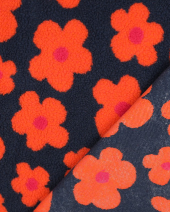 Tissu Mouton Sherpa Motif Fleurs Orange Fluo Fond Bleu - Mercerine