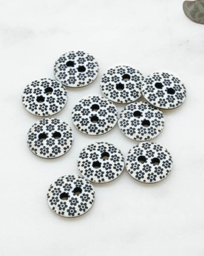 Bouton fantaisie à coudre : motif fleur noir 12mm - Mercerine