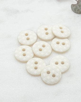 Bouton motif étoile beige 2 trous 12mm - Mercerine