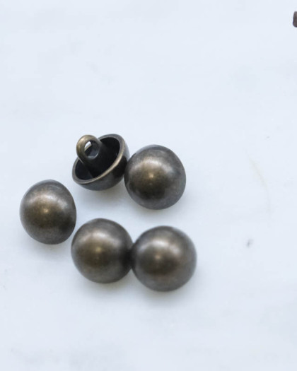 Bouton fantaisie à coudre : demie boule bronze à pied 10mm - Mercerine