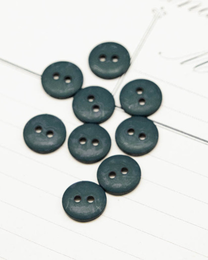 Bouton polyester mat 2 trous vert canard 12mm