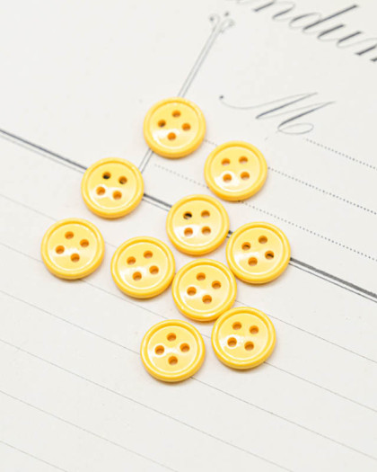 Bouton nylon plat 4 trous jaune 10mm - Mercerine