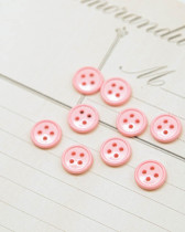 Bouton nylon plat 4 trous rose 10mm