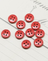 Bouton nylon plat 4 trous rouge 10mm