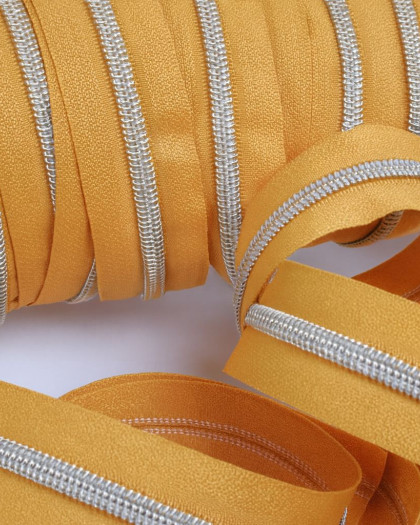 Fermeture au mètre - Ocre Argent - 3 ou 5mm - Mercerine