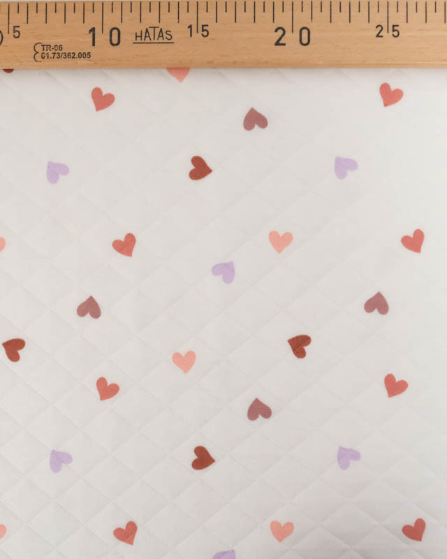 Tissu Jersey Matelassé Léger Ecru Motif Cœur  - Mercerine