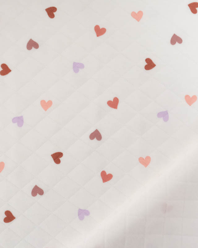 Tissu Jersey Matelassé Léger Ecru Motif Cœur  - Mercerine