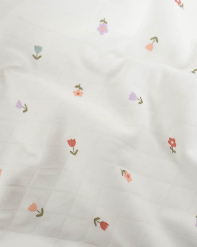Tissu Jersey  Matelassé Léger Ecru Motif Petites Fleurs - Mercerine