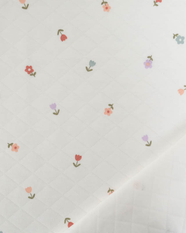 Tissu Jersey  Matelassé Léger Ecru Motif Petites Fleurs - Mercerine