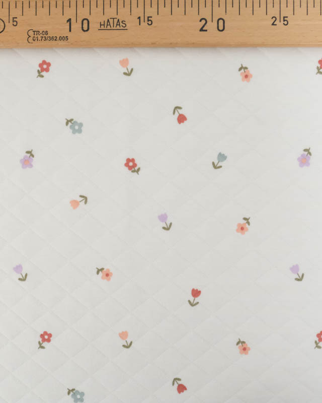 Tissu Jersey  Matelassé Léger Ecru Motif Petites Fleurs - Mercerine