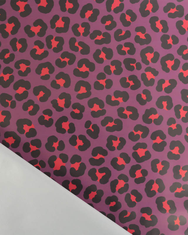 Tissu Imperméable Léopard Mauve et Rouge - Mercerine