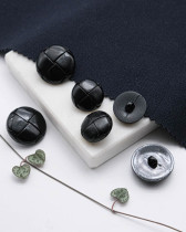 Bouton à pied imitation cuir tressé noir