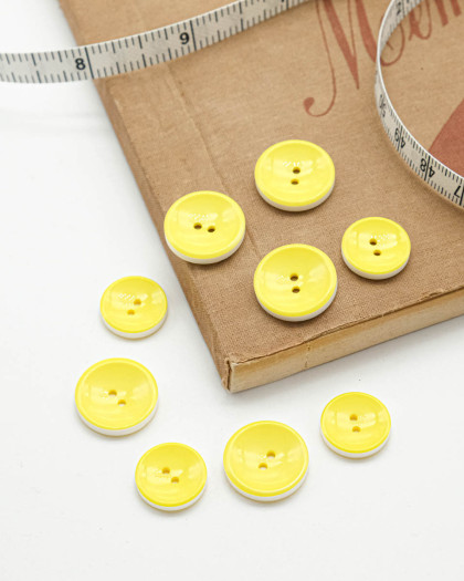 Bouton Jaune Brillant à Bord Blanc