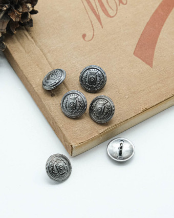 Bouton fantaisie : écusson zamak gris sidéral à pied - Mercerine