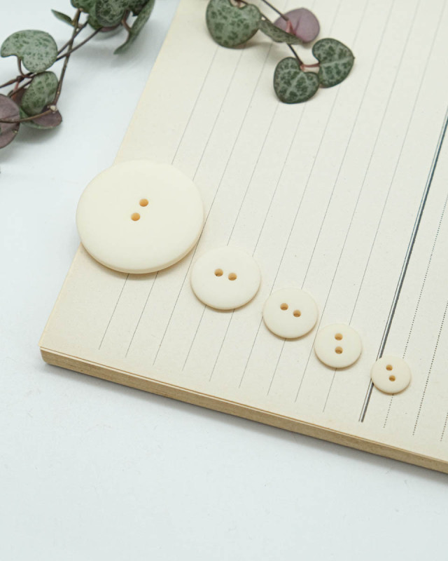 Bouton à coudre : beige mat 2 trous - Mercerine