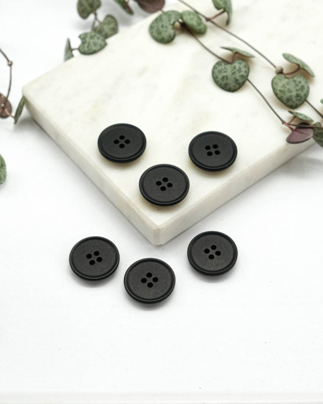 Bouton à coudre : haut à rebord noir 4 trous - Mercerine