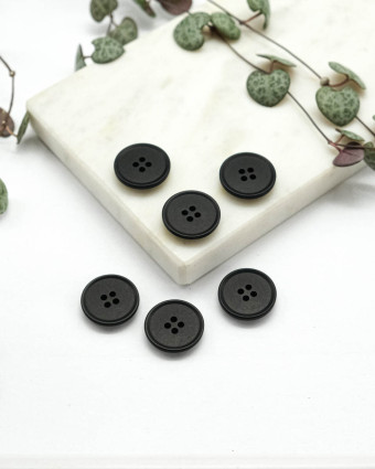 Bouton à coudre : haut à rebord noir 4 trous - Mercerine