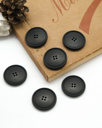 Bouton à coudre : noir mat 4 trous - Mercerine