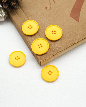 Bouton à coudre : jaune mat 4 trous - Mercerine