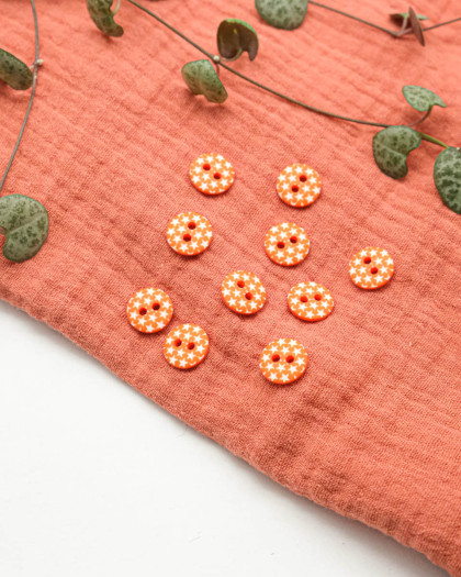 Bouton fantaisie à coudre : motif étoile orange 12mm - Mercerine