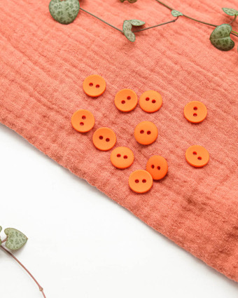 Bouton polyester mat 2 trous orange 12mm - Mercerine
