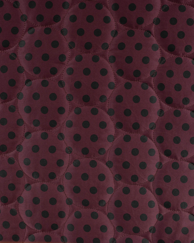 Tissu Matelassé à Pois Noir Fond Prune - Mercerine