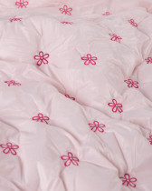 Tissu Matelassé Petites Fleurs Brodées Rose