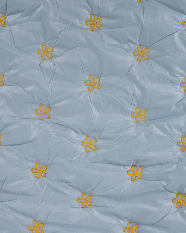 Tissu Matelassé Petites Fleurs Brodées Bleu - Mercerine