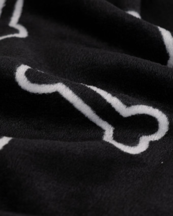 Tissu Polaire Motif Os de Chien Fond Noir - Mercerine