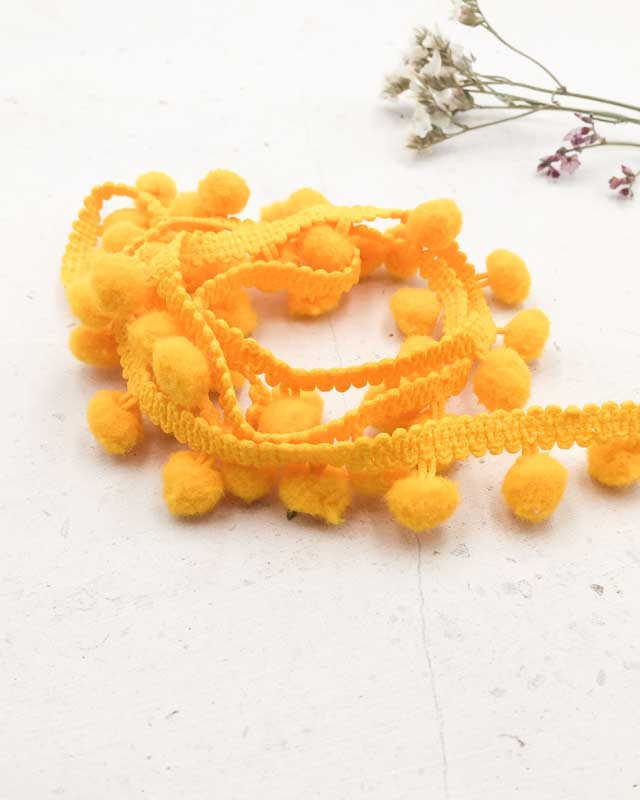 Galon pompon jaune x1m