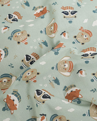 Tissu Coton Motif Animaux en Hiver Fond Vert - Mercerine